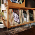 The left flip bin of the Irving Turntable station in golden oak by wickerwoodworks