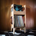 The Deluxe jr Vinyl Record Storage Furniture in golden oak holding jazz collection WickerWoodWorks