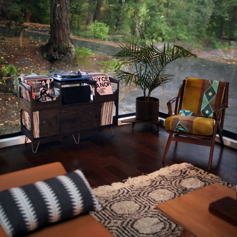 The Irving Turntable station with sliding doors set in a mid century modern listening room